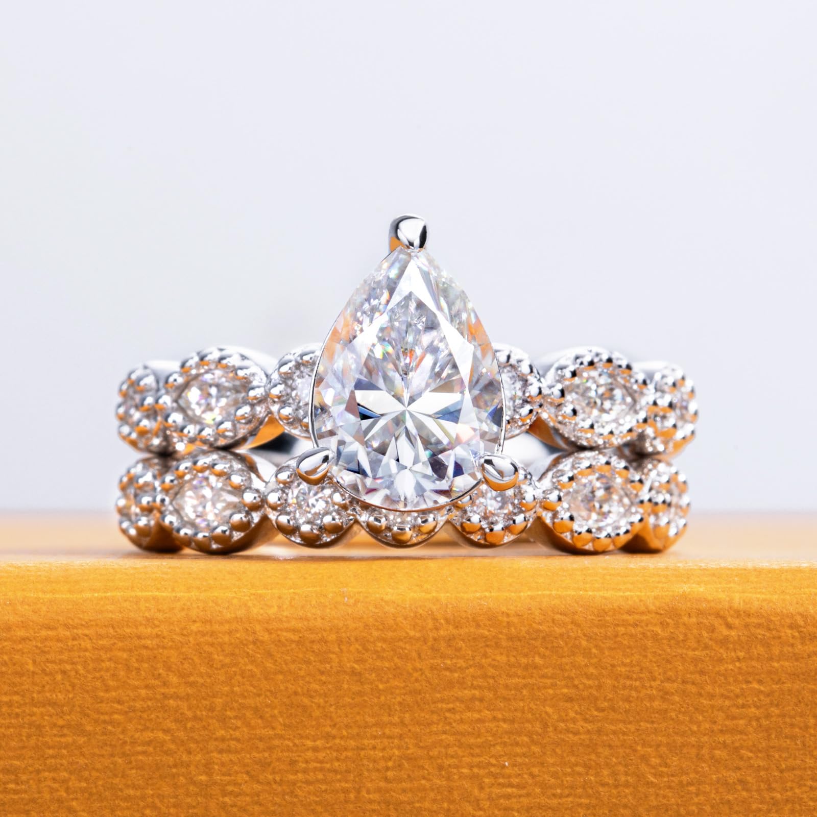 bridal ring set, pear cut ring, wedding ring set, engagement and wedding ring set, solitaire rings, gold rings, pear cut engagement ring, gold rings for women, 14k gold rings, white gold rings, lab grown diamond rings, diamond rings for women, diamond rings, valentines gift for her, birthday gift for her, moissanite rings