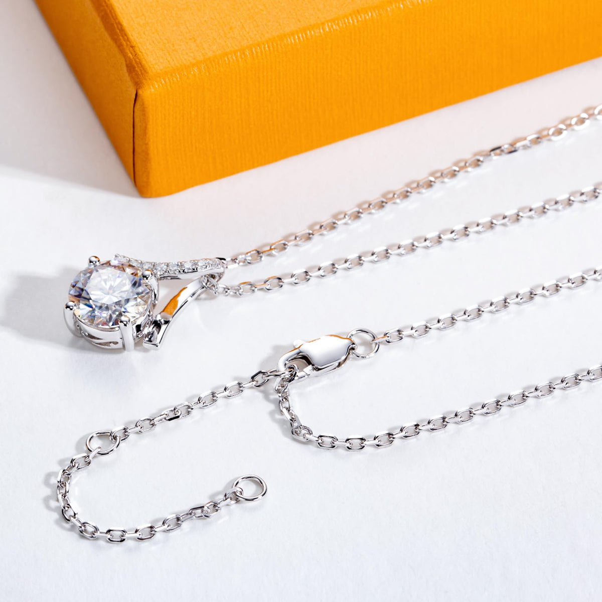 moissanite pendant necklace, infinity necklace women, round cut moissanite necklace, sterling silver pendant, white gold plated jewelry, solitaire necklace women, elegant jewelry gift for her, minimalist luxury necklace, infinity symbol necklace, sparkling pendant necklace
