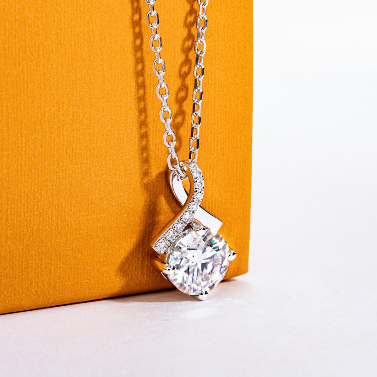 moissanite pendant necklace, infinity necklace women, round cut moissanite necklace, sterling silver pendant, white gold plated jewelry, solitaire necklace women, elegant jewelry gift for her, minimalist luxury necklace, infinity symbol necklace, sparkling pendant necklace