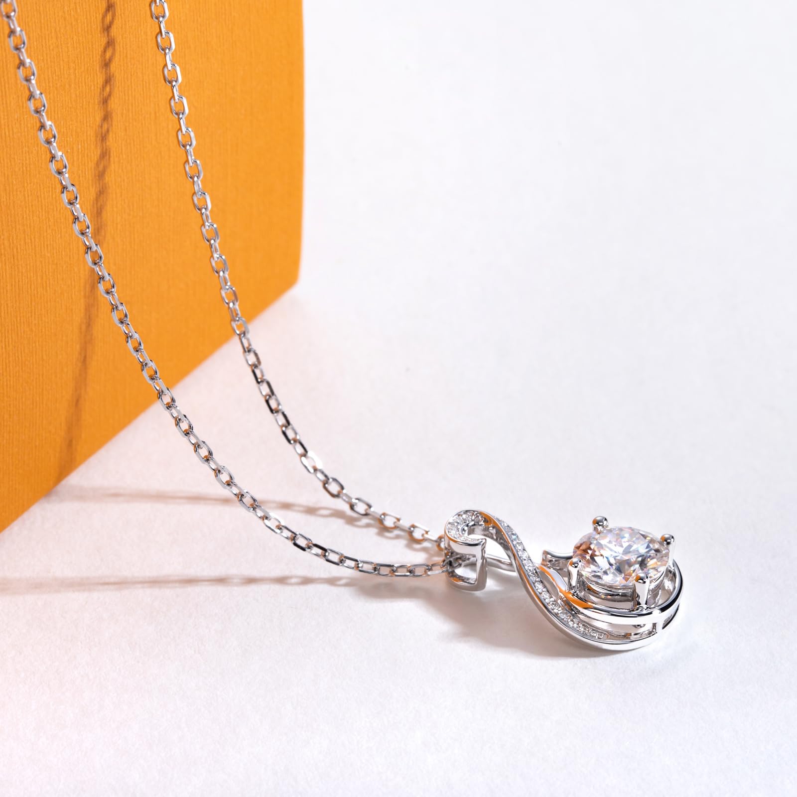 infinity pendant necklace, twisted infinity necklace, round moissanite pendant, sterling silver infinity jewelry, white gold pendant necklace, romantic jewelry gift, elegant swirl pendant, minimalist infinity necklace, gift for her jewelry, luxury silver pendant
