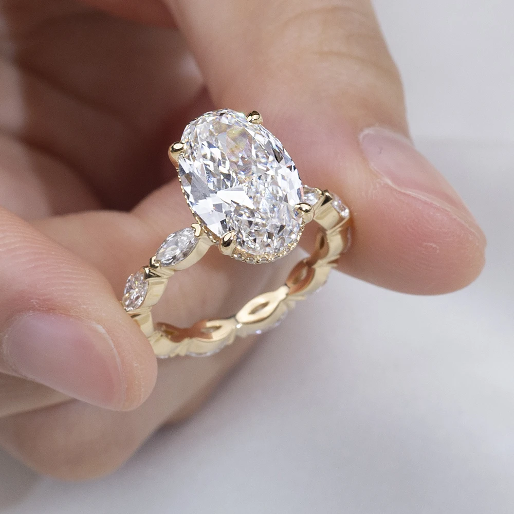 oval moissanite ring gold, oval engagement ring for women, gold plated ring USA, designer rings for women, lab grown diamond alternative, luxury bridal ring, moissanite jewelry UK, unique engagement ring