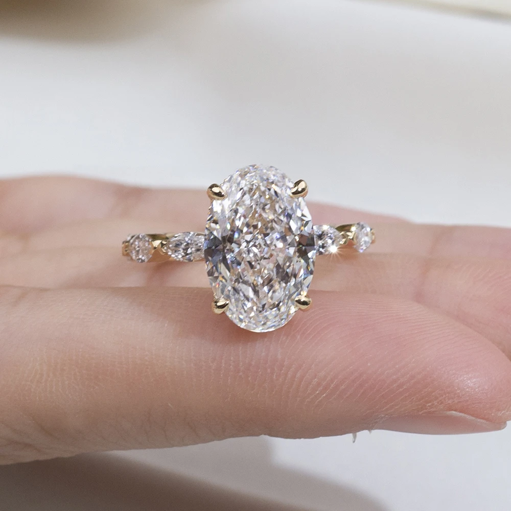 oval moissanite ring gold, oval engagement ring for women, gold plated ring USA, designer rings for women, lab grown diamond alternative, luxury bridal ring, moissanite jewelry UK, unique engagement ring