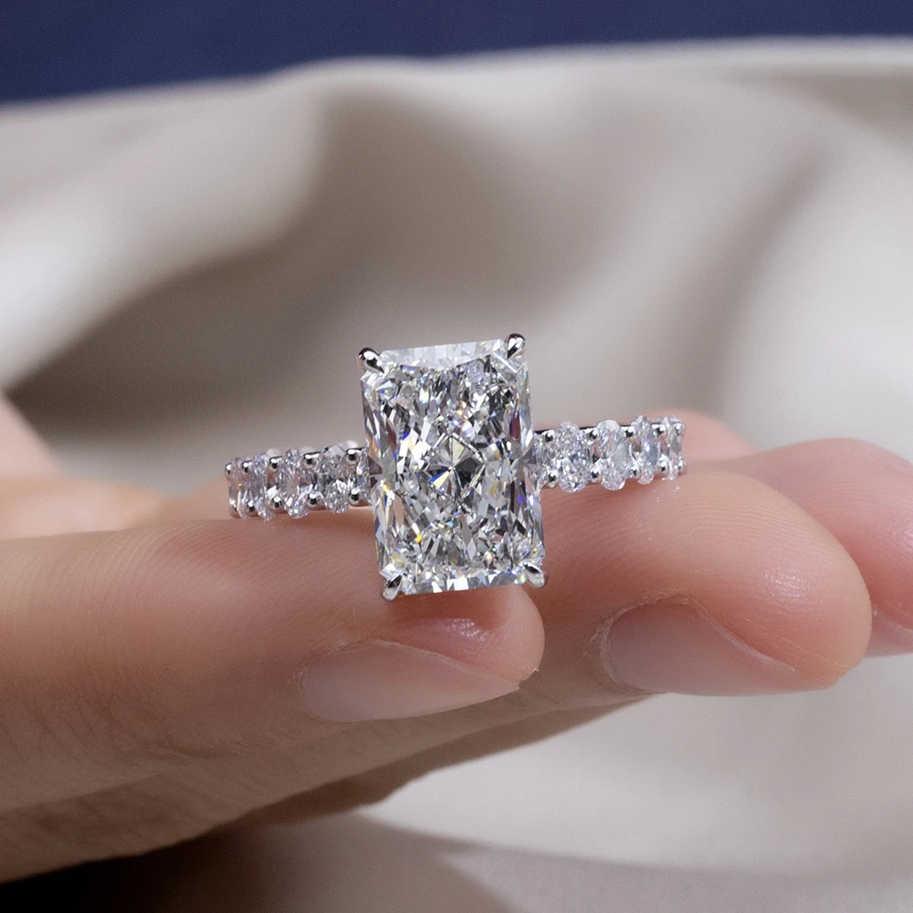 radiant cut moissanite ring white gold, pavé band engagement ring, white gold plated ring USA, lab grown diamond alternative, luxury engagement rings for women, moissanite jewelry India, modern bridal ring, statement ring for women