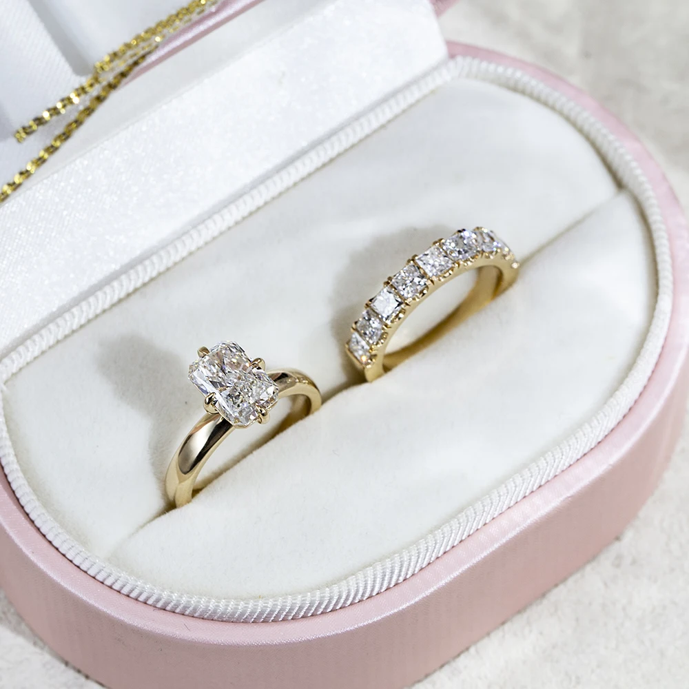 radiant cut moissanite ring gold, engagement ring with accent stones, gold plated engagement ring India, lab grown diamond alternative, luxury bridal rings for women, moissanite engagement ring USA, diamond band ring, statement engagement ring