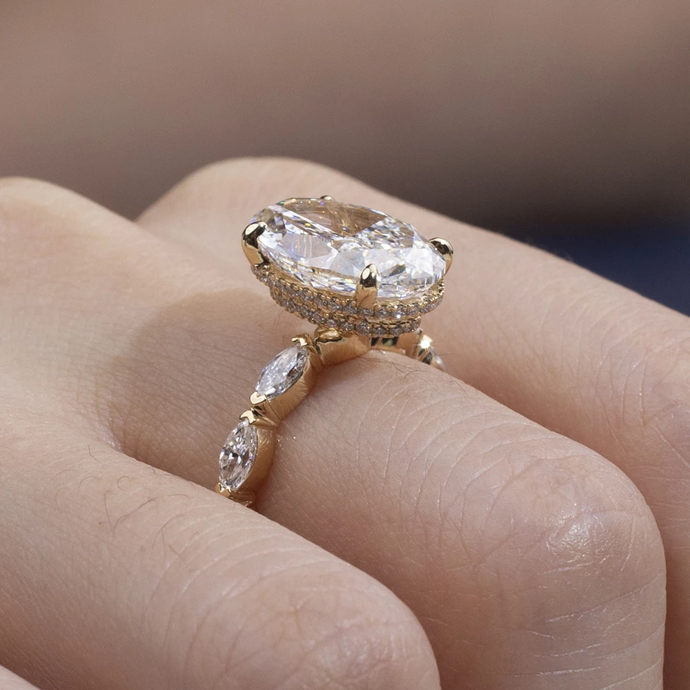 oval moissanite ring gold, oval engagement ring for women, gold plated ring USA, designer rings for women, lab grown diamond alternative, luxury bridal ring, moissanite jewelry UK, unique engagement ring