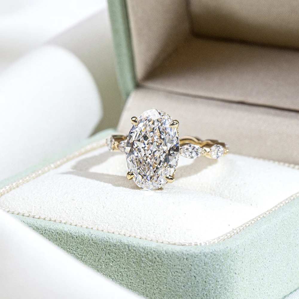 oval moissanite ring gold, oval engagement ring for women, gold plated ring USA, designer rings for women, lab grown diamond alternative, luxury bridal ring, moissanite jewelry UK, unique engagement ring