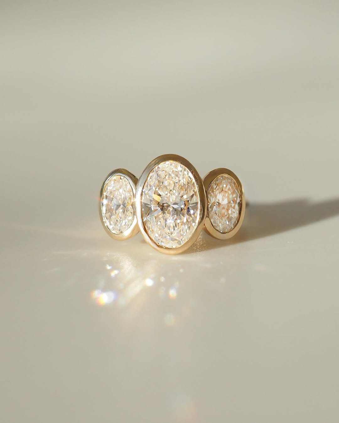 three stone ring, oval moissanite ring, bezel set ring, gold statement ring, anniversary ring, 3 stone anniversary ring, gold designer ring, white gold designer ring