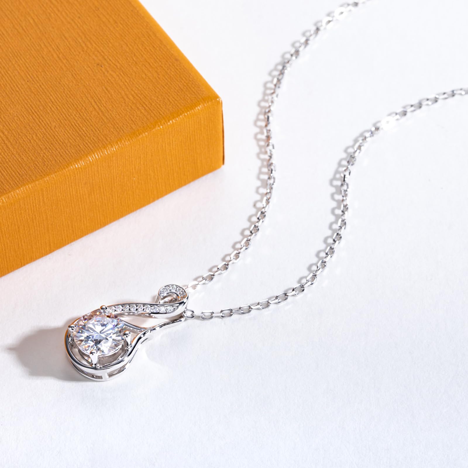 infinity pendant necklace, twisted infinity necklace, round moissanite pendant, sterling silver infinity jewelry, white gold pendant necklace, romantic jewelry gift, elegant swirl pendant, minimalist infinity necklace, gift for her jewelry, luxury silver pendant