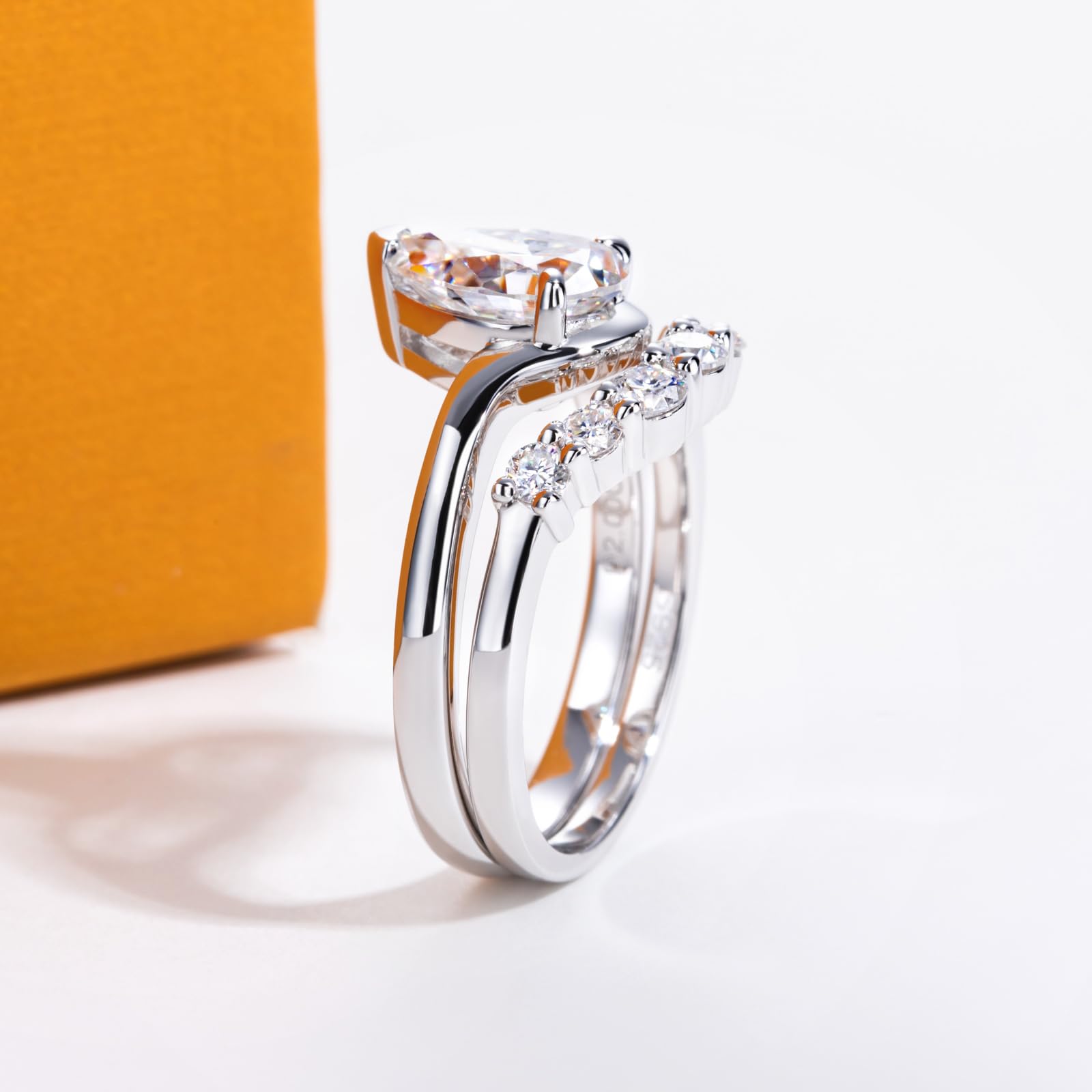 bridal ring set, pear cut ring, wedding ring set, engagement and wedding ring set, solitaire rings, gold rings, pear cut engagement ring, gold rings for women, 14k gold rings, white gold rings, lab grown diamond rings, diamond rings for women, diamond rings, valentines gift for her, birthday gift for her, moissanite rings