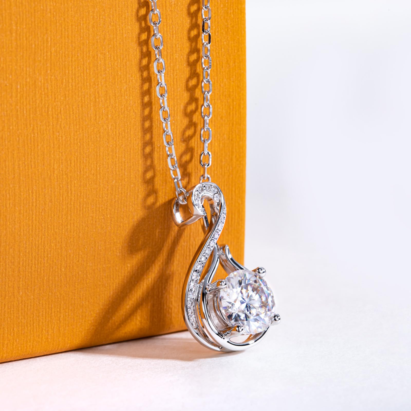 infinity pendant necklace, twisted infinity necklace, round moissanite pendant, sterling silver infinity jewelry, white gold pendant necklace, romantic jewelry gift, elegant swirl pendant, minimalist infinity necklace, gift for her jewelry, luxury silver pendant