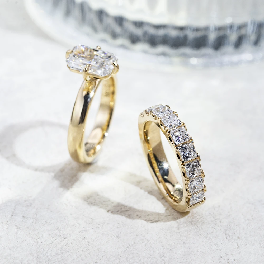 radiant cut moissanite ring gold, engagement ring with accent stones, gold plated engagement ring India, lab grown diamond alternative, luxury bridal rings for women, moissanite engagement ring USA, diamond band ring, statement engagement ring