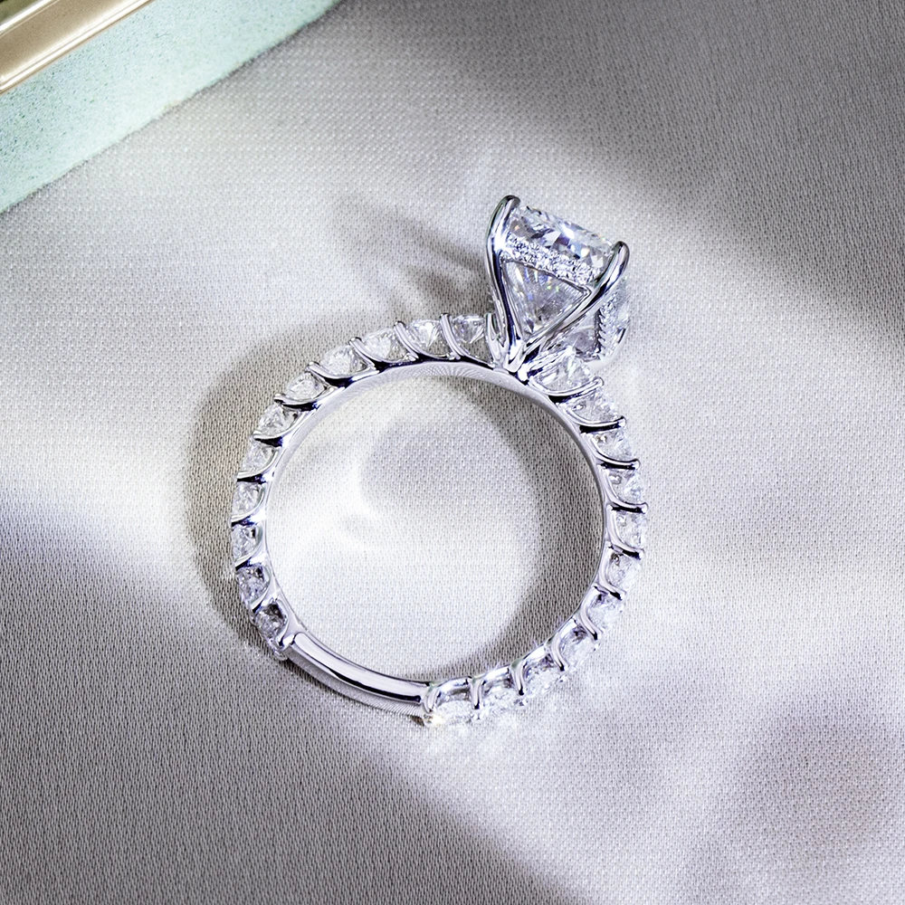 radiant cut moissanite ring white gold, pavé band engagement ring, white gold plated ring USA, lab grown diamond alternative, luxury engagement rings for women, moissanite jewelry India, modern bridal ring, statement ring for women